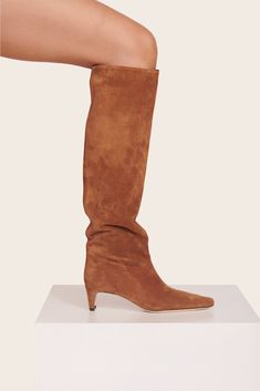 The Wally is a slouchy, suede knee-high boot featuring a pointed toe and a slim heel design. Platform Heels Boots, Thigh High Boots Heels, Animal Print Shoes, Suede Boots Knee High, Heel Design, Hats For Sale, Tan Suede, Mid Calf Boots, Designer Heels