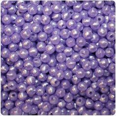 purple pearls are shown in this close up photo, and they look like they have been made