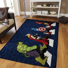 the rug is decorated with an image of captain america and hulk on blue carpeting