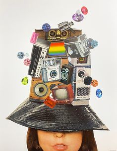 a woman wearing a hat with many objects on it's top and her head in the air