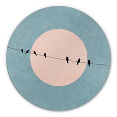 four birds sitting on a wire in front of the moon with pink and blue background