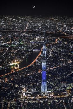 an aerial view of the eiffel tower at night