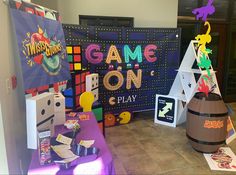 the game room is decorated with games and toys for kids to play on their own