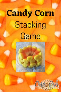 candy corn stacking game with an orange background