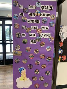 a purple bulletin board with stickers on it in front of a door that says we don't really make memories, we just knew we were having fun