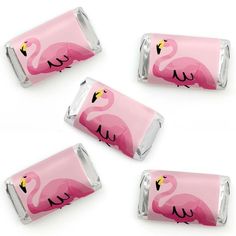 four pink flamingo candy wrappers are shown in the shape of three small bags