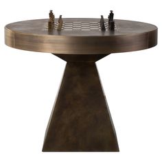 a round table with chess pieces on it