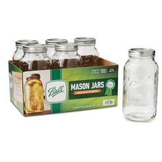 mason jars are lined up in a box