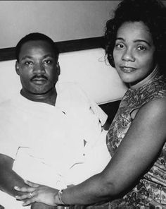 a black and white photo of two people