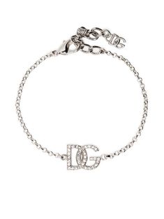 crystal-embellished logo-charm bracelet from DOLCE & GABBANA featuring silver-tone, logo charm, crystal embellishment, lobster claw fastening and adjustable fit. Silver Bracelet Stack, Xoxo Jewelry, Fire Jewelry, Designer Silver Jewellery, Expensive Jewelry Luxury, Crystal Bangle, Girly Accessories, Expensive Jewelry, Crystal Embellishment