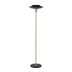 a black and gold floor lamp on a white background