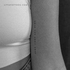 the back of a woman's arm with an inscription on it that reads little tattoos