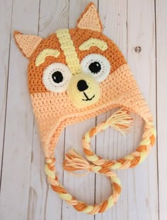 a crocheted hat with a cat face on it