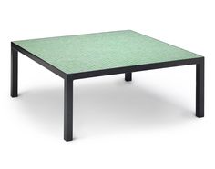 a green table with black legs on a white background