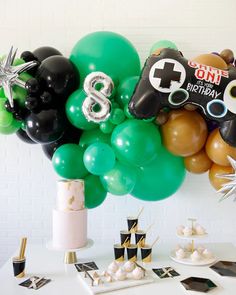 a bunch of balloons that are on a table