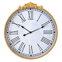 a large clock with roman numerals on the face and gold trim around the hands