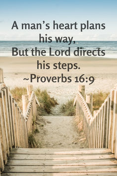 a stairway leading up to the beach with a bible verse about man's heart plans his way, but the lord directs his steps