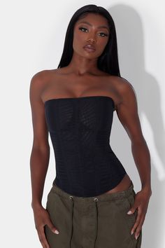 Meet our Muse Mesh Corset Top - a modern sleek black corset top with simple flattering vertical wire boning. Featuring a double layered mesh material making it slightly sheer, strapless strap top and rounded hemline. Our Muse Top provides high support to life your bust and shape your waist. Slip it on with ease by unzipping the invisible back zipper. Underbust Shapewear Corset With Lined Body, Black Boning Corset For Summer, Summer Black Corset With Boning, Nylon Tube Top With Built-in Bra, Sheer Fitted Mesh Corset Dress, Stretch Shapewear Corset With Underwire, Strapless Nylon Tops For Night Out, Stretch Bandeau Corset For Club, Fitted Mesh Shapewear