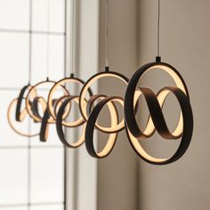 four circular lights hanging from the ceiling