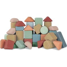 a pile of colorful blocks and shapes on a white background