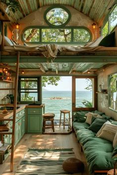 a living room filled with lots of furniture next to a window covered in wood planks