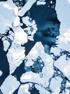 an aerial view of ice floes and water