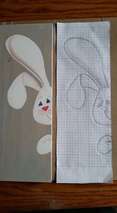 two drawings are shown on paper next to each other, one has a bunny face and the other has a rabbit's head