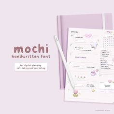 the mochi handwriting font is displayed on top of a pink notebook with a pen