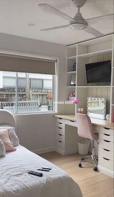 a bedroom with a bed, desk and window