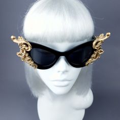 Hand-decorated black & gold filigree ornate sunglasses. Decorated with hand moulded filigree & roses. These can be made in silver filigree and white or black sunglasses if you ask. Please note: There is no readymade sunglasses box large enough for these sunglasses. These sunglasses are wearable art and need to be treated with due care. While i have taken every possible care to make them sturdy throwing them in a bag careless may damage them. Treat them as you would a precious thing... Ha Luxury Gold Cat Eye Sunglasses For Party, Elegant Gold Cat Eye Sunglasses For Evening, Elegant Gold Cat Eye Sunglasses, Elegant Cat Eye Sunglasses With Tinted Lenses For Party, Gothic Black Sunglasses For Party, Black Gothic Sunglasses For Party, Vintage Black Sunglasses For Parties, Gold Party Sunglasses, Aesthetic Pictures Art