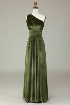 a green dress on a mannequin dummy