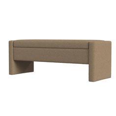 the back end of a couch that is made out of fabric and has a long armrest