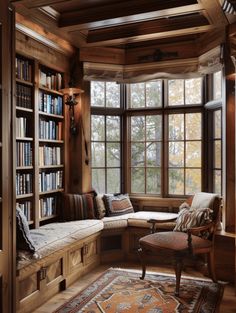 a room that has some books on the shelves and a couch in front of it