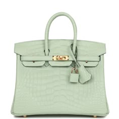 This Birkin is in Vert D'Eau matte Mississippienis alligator leather with gold hardware and has tonal stitching, front strap, two straps with center toggle closure, clochette with lock and two keys and double rolled handles. The interior is lined with Vert D'Eau chevre and has one zip pocket with an Hermes engraved zipper pull and an open pocket on the opposite side. Payment for this item is by Bank Wire only unless other arrangements have been made. Collection: UOrigin: FranceCondition: Pristin Hermes Bags Birkin, Birkin Bags, Hermes Birkin Handbags, Hermes Birkin 25, Hermes Box, Birkin 25, Hermes Bags, Hermes Bag, Sierra Leone