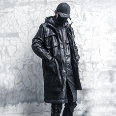 Stay warm and stylish this winter with the Techwear Black Long Jacket. This sleek black jacket is not only fashionable, but it's also packed with functional features to keep you comfortable and protected in any weather. Made from high-quality materials, the Techwear Black Long Jacket is waterproof, windproof, and insulated to keep you warm and dry. Its long length provides extra coverage, while the adjustable hood and cuffs allow you to customize your fit. The jacket also has multiple pockets fo Black Long Jacket, Techwear Ninja, Techwear Cyberpunk, Techwear Jacket, Techwear Outfits, Cyberpunk Clothes, Vintage Coats, Cyberpunk Style, Mens Windbreaker