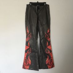 Nwt Dolls Kill Current Mood Angel Aflame Lace Up Flare Pants. Black Pleather With Red Flame Details On The Legs. Front Lace Up Detail. Low Rise. Flare Leg. Size Xs. No Stretch. Measurements Are Approximate And Taken While Laying Flat. Waist: 13.25” Hips: 17” Rise: 8” Inseam: 32” Red Lace Up Pants, Gothic Pants Vampirefreaks, Lace Up Flare Pants, Flame Leather Pants, Dark Khaki Pants, Flame Pants, Black Lace Flare Pants, Gothic Flare Pants, Flare Pants Black