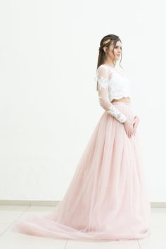 Bridal tulle skirt, Wedding tulle skirt, White bridal tulle skirt, Tulle skirt with train, Pink bridal tulle skirt, Magnificent tulle skirtA beautiful option for a festive dress - skirt with a train. The airy splendor of tulle in combination with a lace top creates a stylish bright image. A long train gives the woman a truly royal chic. A luxury model can be a central detail of an evening or wedding ensemble.In this skirt, we perfectly matched the colors of the lining and belt to be the perfect Bridesmaid Tulle Wedding Dress With Sweep Train, Bridesmaid Wedding Dress With Sweep Train And Tulle Material, Long Tulle Organza Skirt, Prom Tulle Petticoat, Fitted Tulle Wedding Dress For Bride, Long Organza Tulle Skirt, Wedding Dress With Sweep Train, Long Tulle Wedding Skirt, Sheer Tulle Wedding Dress For Bride