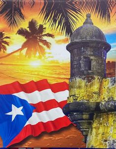 the flag of cuba is flying in front of a lighthouse and palm trees at sunset