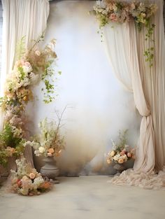 an image of a wedding ceremony setting with flowers on the stage and draping