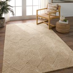 This hand-tufted rug provides rich texture and global appeal through the unique geometric pattern and looped jute and wool fibers. The neutral tan and ivory colorway adds to any indoor, modern space. Jute works best in low traffic areas of the home such as formal living rooms, bedrooms, and formal dining spaces. Dakota Fields Rug Size: Rectangle 10' x 14' | Beige Rectangle 10' x 14' Area Rug - Dakota Fields Oisin Solid Color Hand Tufted Wool / Jute Area Rug in 168.0 x 120.0 x 0.5 in brownWool | Boho Office Rug, Beige Living Room Rug, Neutral Runner Rug, Tan Rug Living Room, Area Rugs Over Carpet Living Room, Neutral Rugs Living Room, Rugs In Home, Amazon Area Rugs, Modern Bedroom Rug