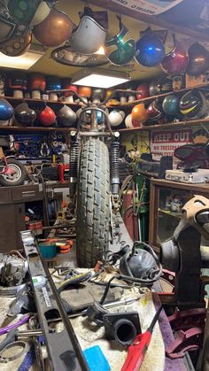 many different types and sizes of bicycles in a shop