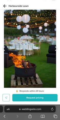 a fire pit is set on top of a wooden pallet