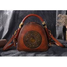 Material: Genuine Leather Size: 9.84’(l) * 3.94’(w) * 8.86’(h) Weight: 1.32 lb Inner: 4 separate pockets (including 1 zipper pocket) Capacity: Medium FEATURES: Shape: Shell tote bag Private custom: Pure handmade Ethnic Style: Totem embossing Vintage Leather Handbag, Shell Bag, Hobo Crossbody Bag, Women Crossbody Bag, Handbags Women, Leather Satchel Bag, Leather Crossbody Purse