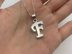 Letter F Pendant made of Solid 925 Sterling Silver ☞ made to last. Full Letters Collection (Silver)Full Letters Collection (Gold)Full Letters Collection (White Gold)Full Letters Collection (Rose Gold) Details:• Letter F Pendant• Dimensions: Pendant Height 26mm, Width 14mm• Free Complimentary Chain• Solid 925 Sterling Silver SKU TE-103 F Necklace, Initial F, Letter Necklace Initials, Cute Gift Boxes, Letter F, Letter Necklace, Support Handmade, Pendant Design, Dream Jewelry