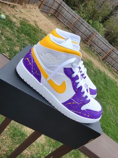 Custom Kobe inspired Jordan 1s. Can do any players theme and colors! Please make sure you choose the correct size, all sales are final  Any questions inbox me first please. *Save $25 ordering from my website BrockKustomz.com* Shoes are Unisex men 7= womens 8.5 and so fourth.  In example For a 7 you may receive a women's 8.5. The shoe will be the exact same. Custom Jordan Shoes, Custom Jordan, Custom Sneakers Diy, Custom Jordans, Kobe Shoes, Jordan Shoes Retro, All Nike Shoes, Shoes Retro, Jordan 1s