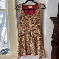 Very Rare, Was Unable To Find This Brand Online, May Have Been A Small Local Brand Or Homemade. Beautiful Floral Velvet In Amazing Condition, With A Burnt Orange Silk Interior That Is Classic 60s. Buttons Up The Front. Possibly A Medieval Revival Dress. Would Love For This To Go To A Loving Home. Fits A Size Medium, Can Post Measurements On Request, I Lost My Tape Measure. Tags: Vintage, Antique, 60’s, 70’s, Hippie Americana, Coquette, Retro, Floral, Velvet, Silk, Collectible, Handmade, Gunne Sa Cute 70s Dresses, 1970s Dresses Formal, 70s Medieval Revival, 60s Medieval Revival, Americana Coquette, Medieval Revival, Dress Bell Sleeve, 60s Mini Dress, 1970s Dresses