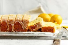 a loaf of lemon pound cake sitting on top of a pan