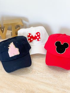 These hats are perfect for your next theme park vacay. The magical collection cap hat comes in adult and youth sizes. Cap comes with your choice of Chenille Patch. Patch is applied with industrial heat. 100% bio-washed chino twill Unstructured, six-panel, low-profile Pre-curved visor Self-fabric tri-glide buckle closure Tear away label Disney Hat, Disney Hats Women, Adjustable Disney Cap, Disney Trucker Hat, Disney Baseball Cap, Disney Chenille Patch Shirt, Disneyland Hats, Kids Baseball Caps, Purple Petunias