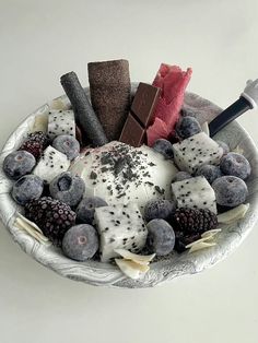 a bowl filled with different types of desserts