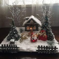 a christmas scene made out of fake snow